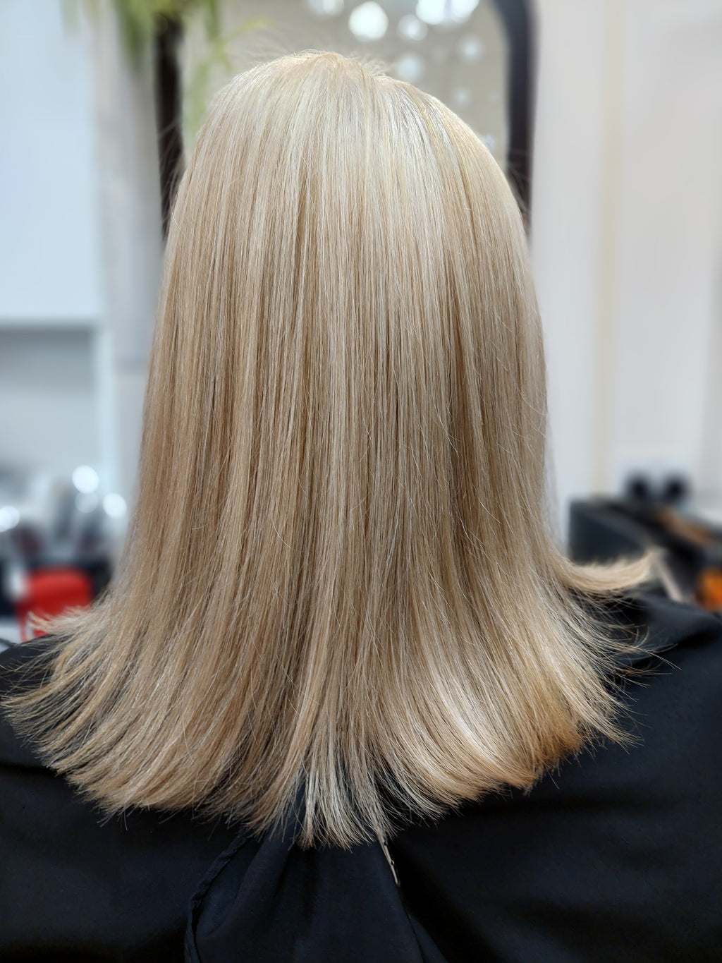 Tinted roots, cut and blow dry hair to shoulder