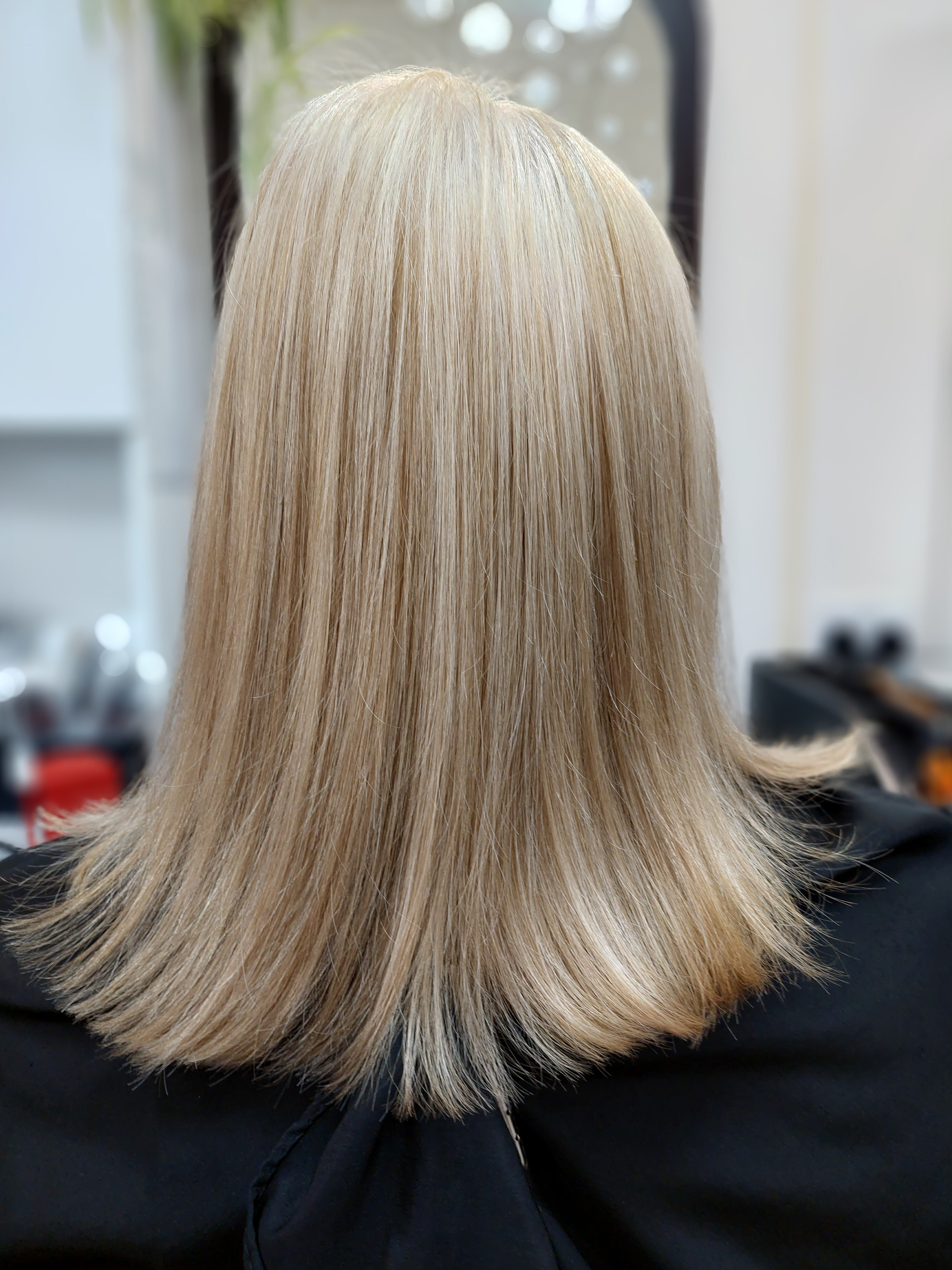 Tinted roots, cut and blow dry hair to shoulder